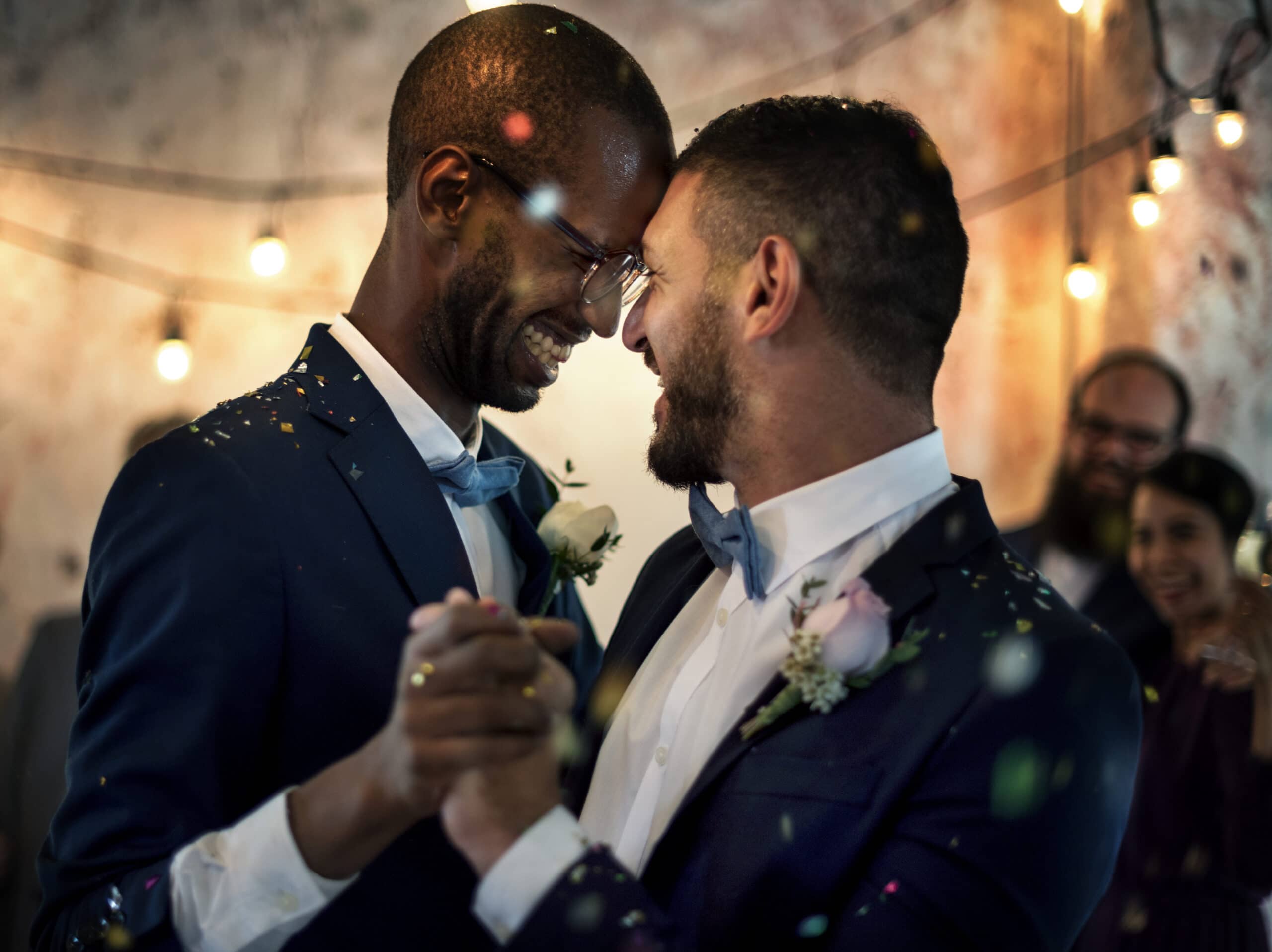 Picture of two men dancing at a wedding